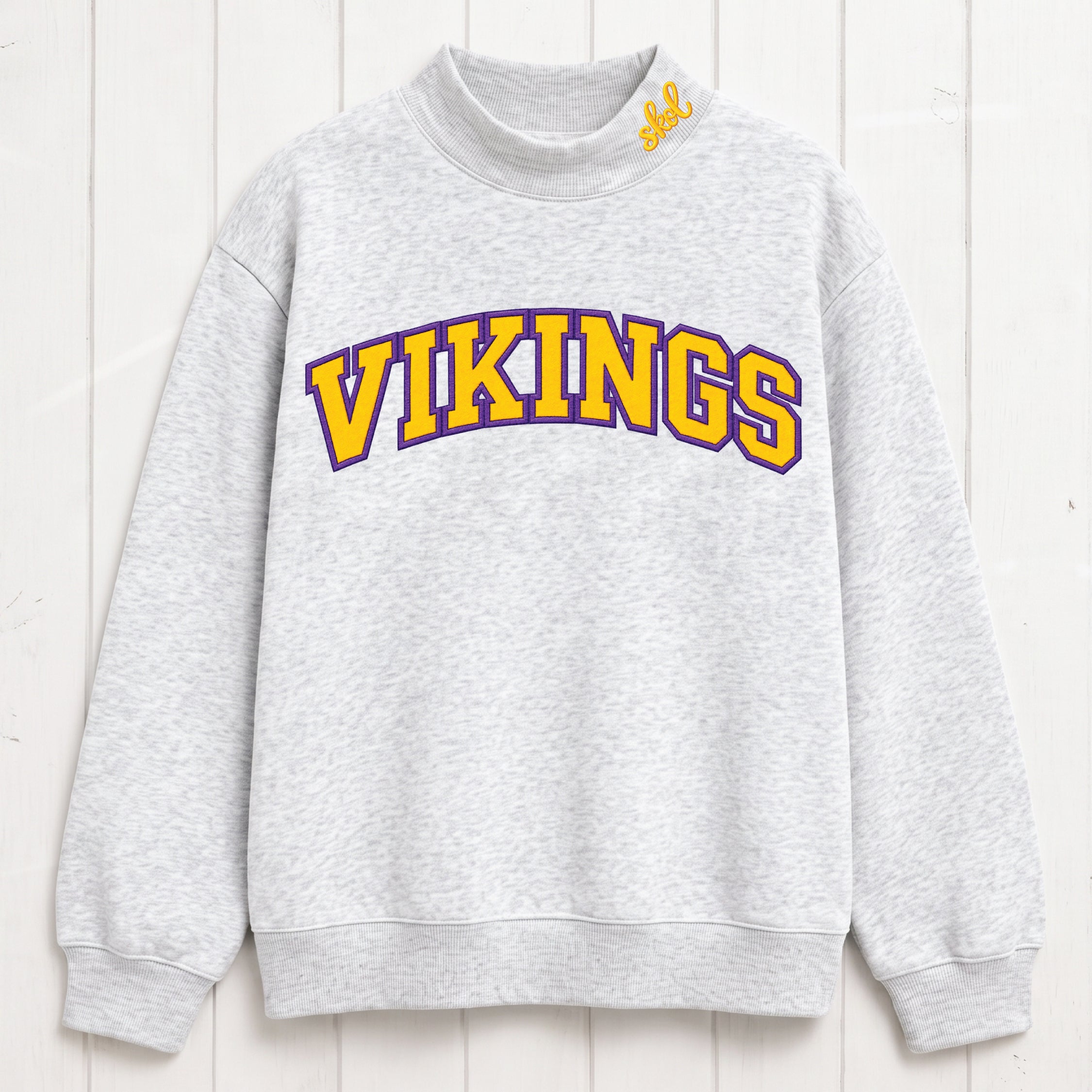Stacked Vikings Appliqué Script Mock Neck